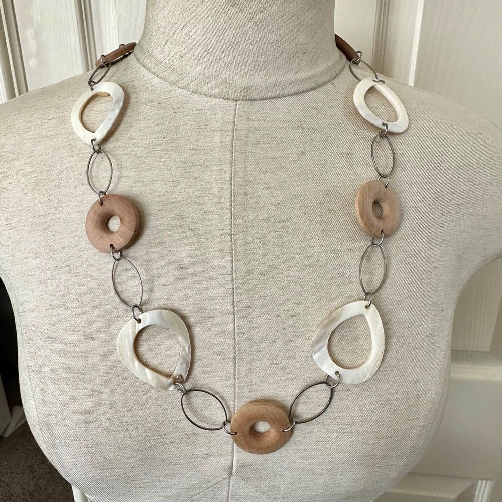 Silver tone white shell and wood bead necklace